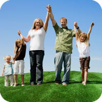 image of a happy family holding hands while raising their arms